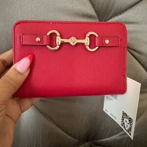 COPY - Anne Klein Crimson Wallet
5.25” x 3.50 “
Gold Emblems
Brand New